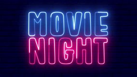 Movie night neon sign. Movie night text font with light. Luminous and shimmering haze inside the letters of the text Movie night.  - Powered by Shutterstock - Get 15% off with code: PIKWIZARD15