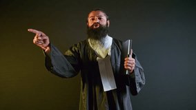 Jurist raises hand declaring solid evidence, Furious lawyer taps proof book eyes blazing with rage, Bearded advocate tapping case file, Attorney points finger at opposition, Claim for instant justice - Powered by Shutterstock - Get 15% off with code: PIKWIZARD15