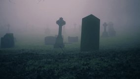 Eerie Graveyard in thick fog and mist medium 4k shot selective focus - Powered by Shutterstock - Get 15% off with code: PIKWIZARD15