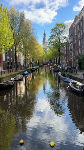 Facades of old historic Houses over canal water, Amsterdam, Netherlands