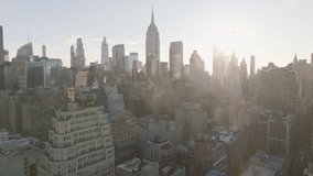 Aerial view of The Empire State Building at sunrise. Shot in Midtown Manhattan. - Powered by Shutterstock - Get 15% off with code: PIKWIZARD15