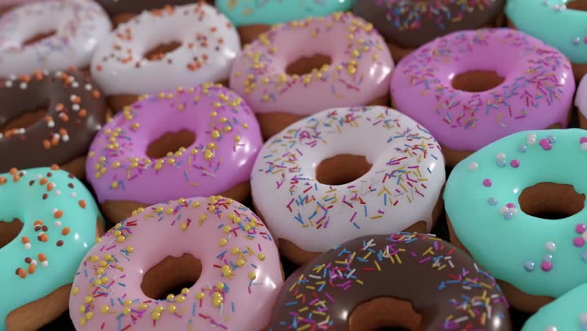 Close-up shot of assorted colorful donuts with sprinkles, perfect for food blogs, bakery websites, and dessert menus.