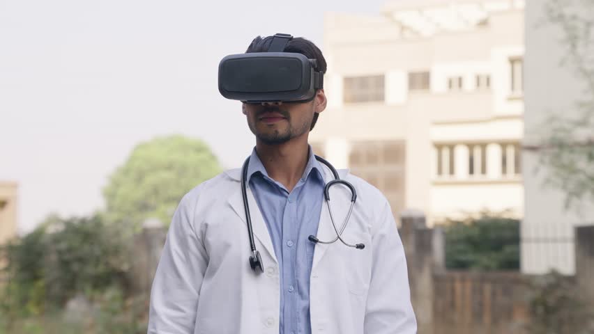 Indian Doctor Wearing VR headset, Virtual Reality - Powered by Shutterstock - Get 15% off with code: PIKWIZARD15