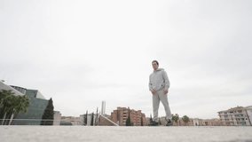 Parkour athlete performing a frontflip in urban environment - Powered by Shutterstock - Get 15% off with code: PIKWIZARD15