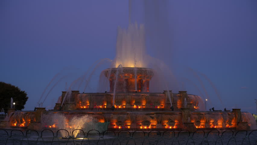 Buckingham Fountain illuminated at night in downtown Chicago, Illinois.