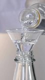 Pouring vinegar into a bottle with funnel - Powered by Shutterstock - Get 15% off with code: PIKWIZARD15
