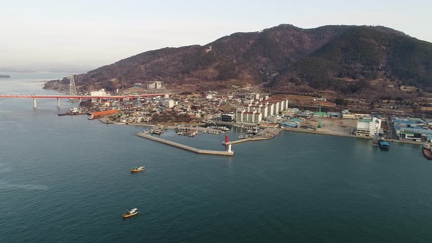 view of the bay of city with mountain