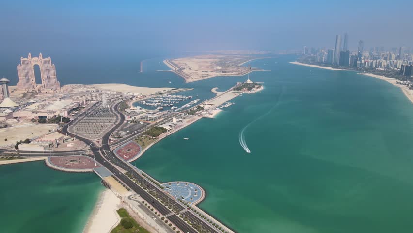 Abu Dhabi - UAE Corniche (Break Water) and Marina, Ettihad Towers, Marina Mall and Presidential Palace - Drone Video