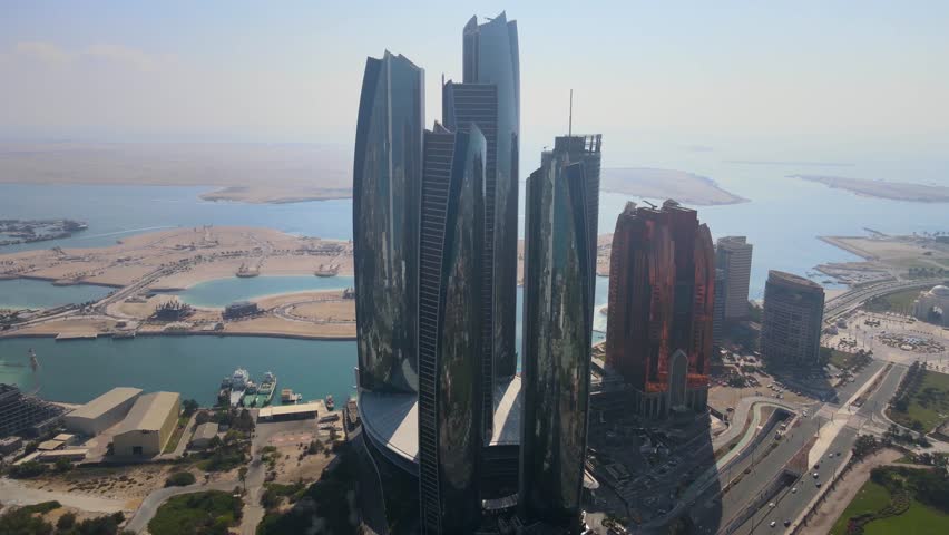 Abu Dhabi - UAE Corniche (Break Water) and Marina, Ettihad Towers, Marina Mall and Presidential Palace - Drone Video