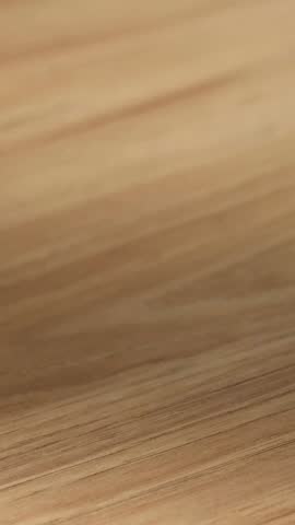 Waiter presenting a meat salad with sauce