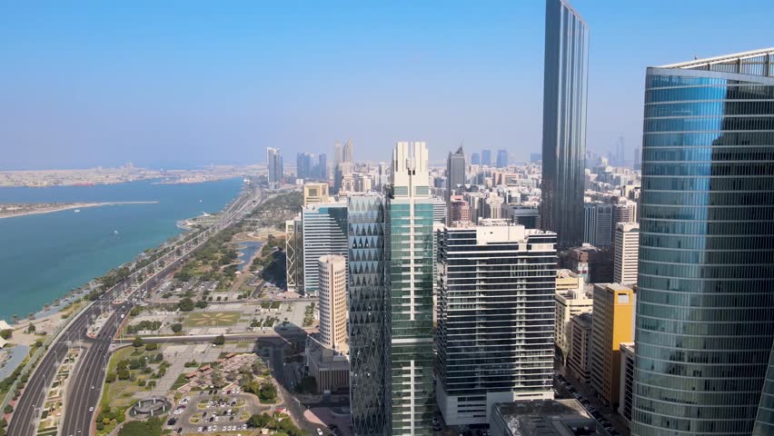 Abu Dhabi - UAE Corniche (Break Water) and Marina, Ettihad Towers, Marina Mall and Presidential Palace - Drone Video