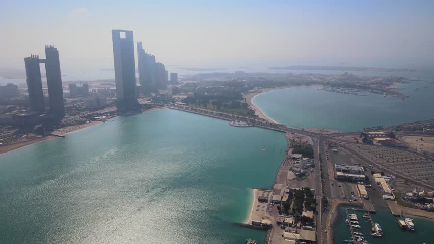 Abu Dhabi - UAE Corniche (Break Water) and Marina, Ettihad Towers, Marina Mall and Presidential Palace - Drone Video