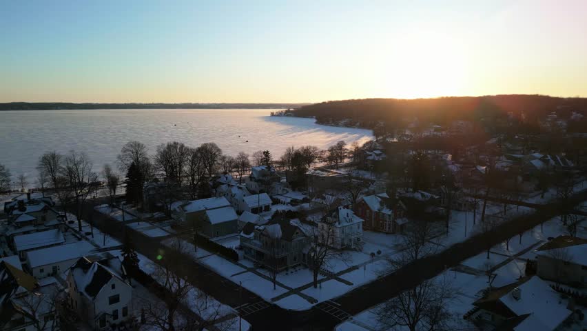 Spectacular Drone Shot Above Lake Geneva, Wisconsin during Winter Golden Hour