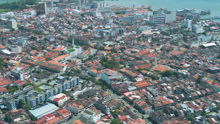 An aerial view of Penang cityscape capturing a mix of colonial and modern buildings, reflecting the city