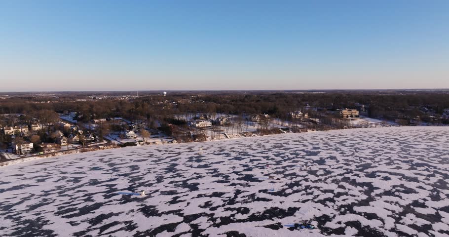 Scenic Aerial View of Mansions on Lake Geneva, Wisconsin. Winter Day