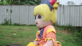 a street clown sits down because she's tired - Powered by Shutterstock - Get 15% off with code: PIKWIZARD15