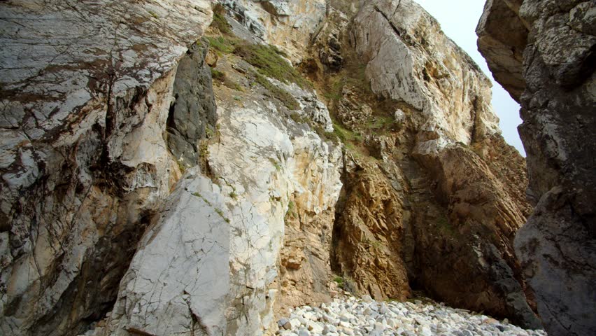 Beautiful rocks coast on the Atlantic coast. Incredible beauty rocky  of the Atlantic Ocean coast near Cape Roca. Low angle view to the beautiful rocks
