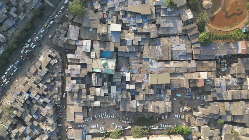 Aerial Drone View of the Slum of Dharavi, in Mumbai, India. The biggest slum in the world. RAW - no filter.