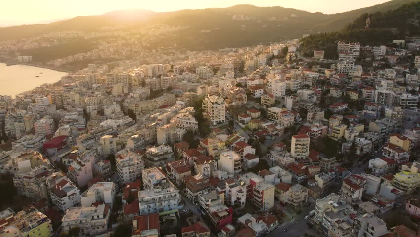 Kavala Greece Aerial View of Hillside Buildings City Center, Golden Hour Lighting