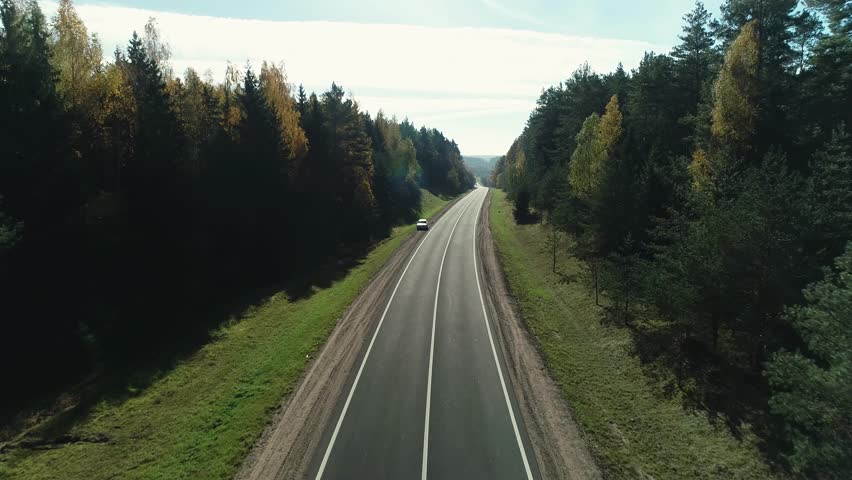 Aerial view of the road running through the rural European countryside