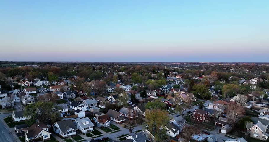 Drone landscape view of neighborhoods in Omaha, Nebraska at dawn