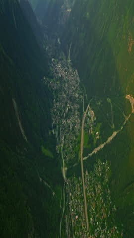 Drone view of Chamonix. Chamonix-Mont-Blanc is a resort town in France near the border with Switzerland and Italy. It is located at the foot of Mont Blanc, the highest peak in the Alps