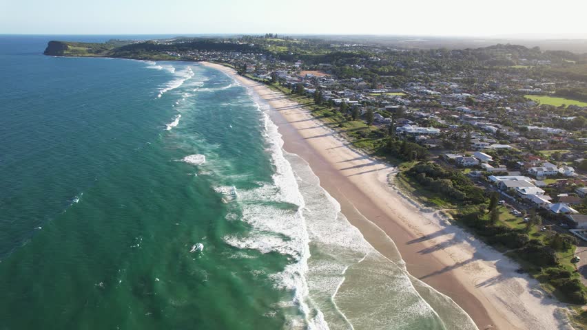 Sea Waves In The Seven Mile Beach On A Sunny Day In Lennox Head In New South Wales, Australia. - aerial descend shot