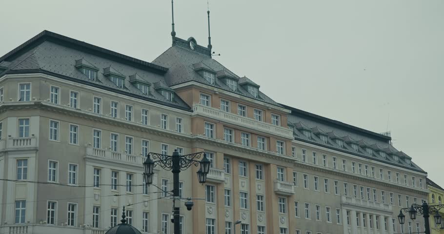 Classic European style building in Bratislava with ornate windows and rooftop details