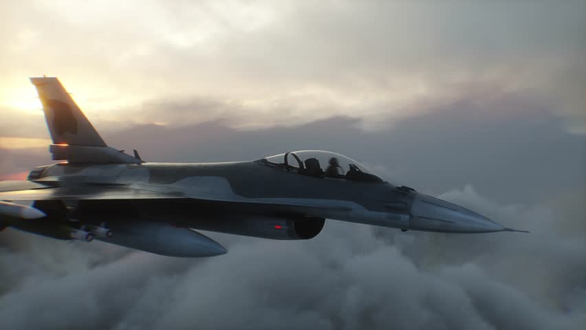 Military fighter jet F-16 flying over clouds. Air force.
