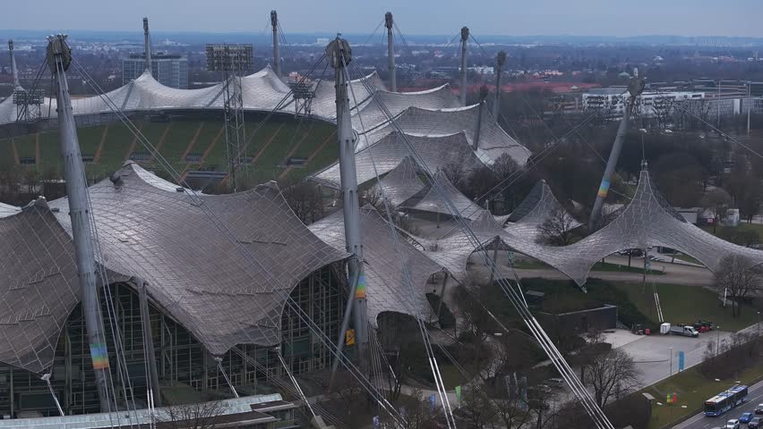 Aerial pan of Olympiapark in Munich, showcasing the Olympic Stadium