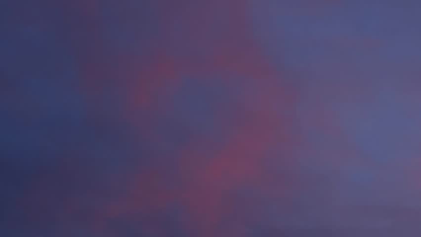 Flowing heart shaped sunset cloud 