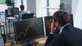 Financier frustrated financial loss looking stock market charts at multiple monitors closeup. Forex trader losing money on crypto exchange sitting office open space. Stressed investor analyzing graphs - Powered by Shutterstock - Get 15% off with code: PIKWIZARD15