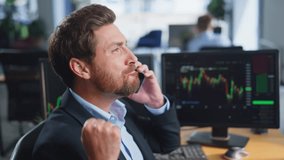 Calling businessman rejoicing financial income looking on fund market charts in office space closeup. Excited investor sharing success in smartphone talk. Overjoyed broker discussing currency growth - Powered by Shutterstock - Get 15% off with code: PIKWIZARD15