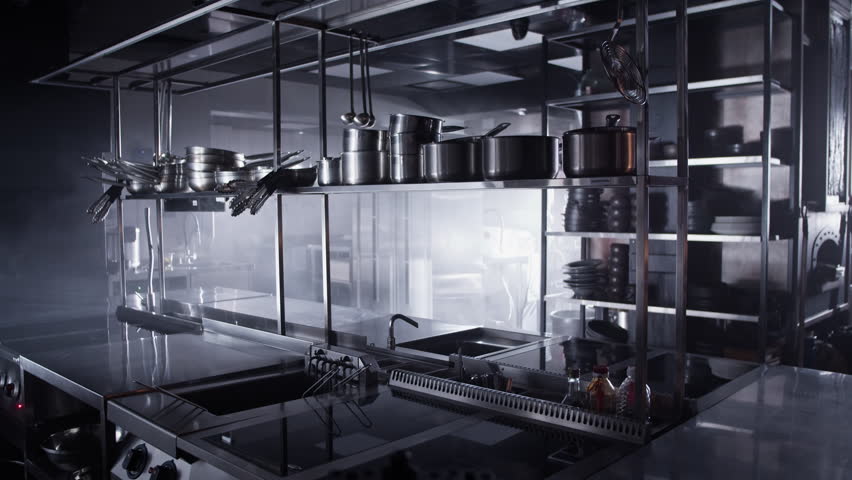 Restaurant kitchen counter and shelves with cleaned vessels
