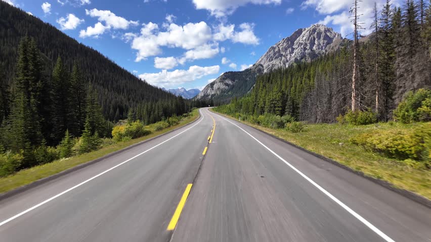 POV Driving on a Scenic Mountain Highway: A Summer Road Trip. BC, Canada.
