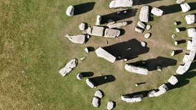 Ascending Overhead birds eye drone aerial view Stonehenge UK long shadows - Powered by Shutterstock - Get 15% off with code: PIKWIZARD15
