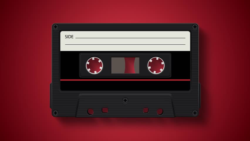 Retro audio cassette tape spinning on red background