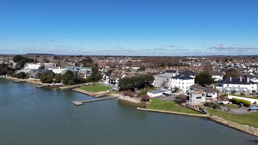 Slow Panning drone aerial Large Waterfront houses Mudeford Christchurch UK