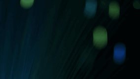 Sharp blue vertical lines intersect with soft green and blue bokeh circles, creating a striking abstract visual in motion. - Powered by Shutterstock - Get 15% off with code: PIKWIZARD15