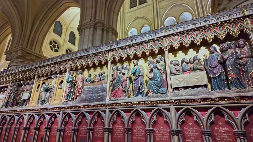 Ornate biblical relief inside Notre-Dame de Paris cathedral, France. Close-up