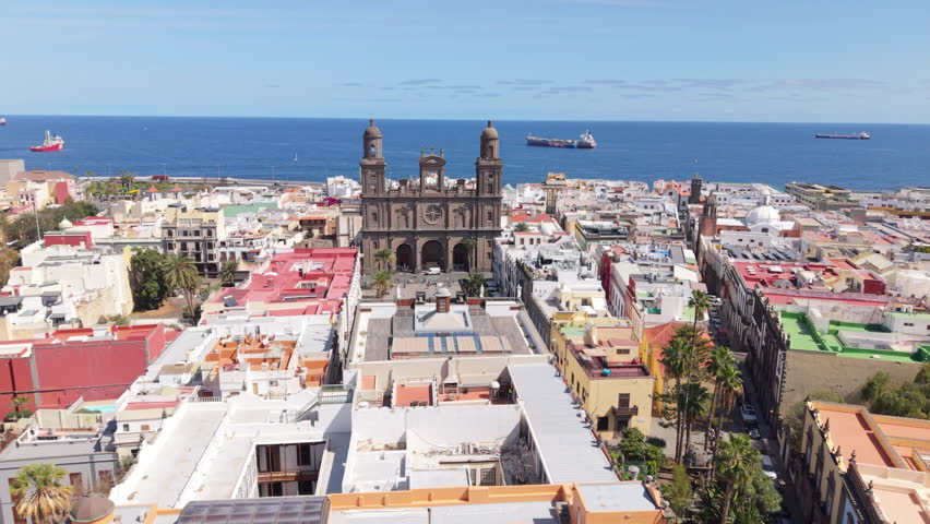 Drone Las Palmas urban landscape, from historic landmarks to modern infrastructure, panoramic tracking right