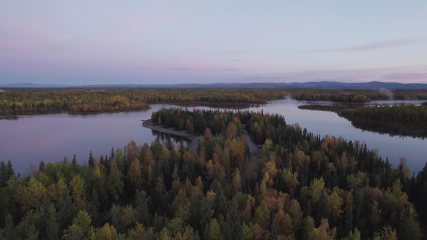 Autumn forest and lake in USA, aerial drone view