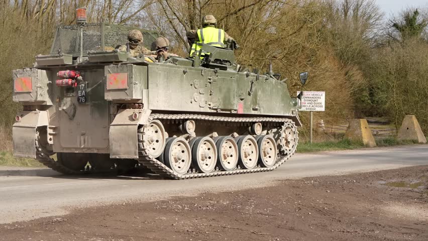 a British army Bulldog FV432 tank in motion on a military exercise