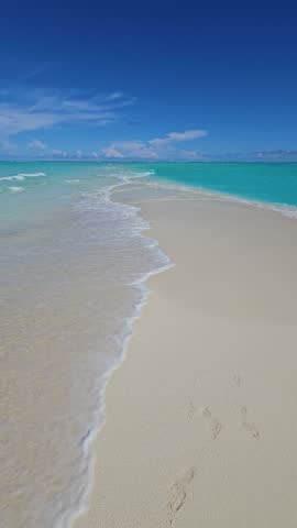 Maldives beach or sand bank with white sand beach and turquoise ocean sunny day