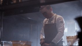 Chef chopping with knife in kitchen - Powered by Shutterstock - Get 15% off with code: PIKWIZARD15