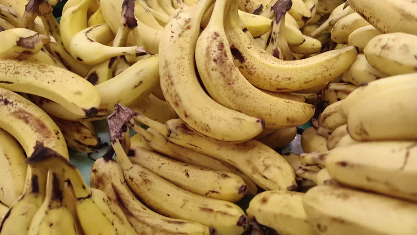 Ripe Yellow Bananas on the Market Counter Footage.