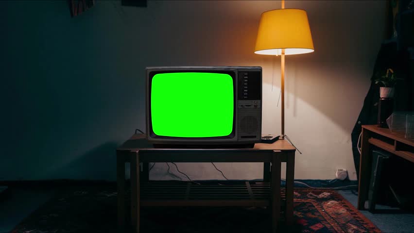 Old green screen TV turning on with green screen television for video masking retro vintage TV with glitch effect green screen