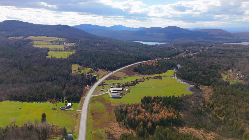 Experience the stunning autumn colors of Stowe, Vermont from an aerial perspective. Witness breathtaking shots that showcase the incredible fall foliage against a picturesque natural backdrop