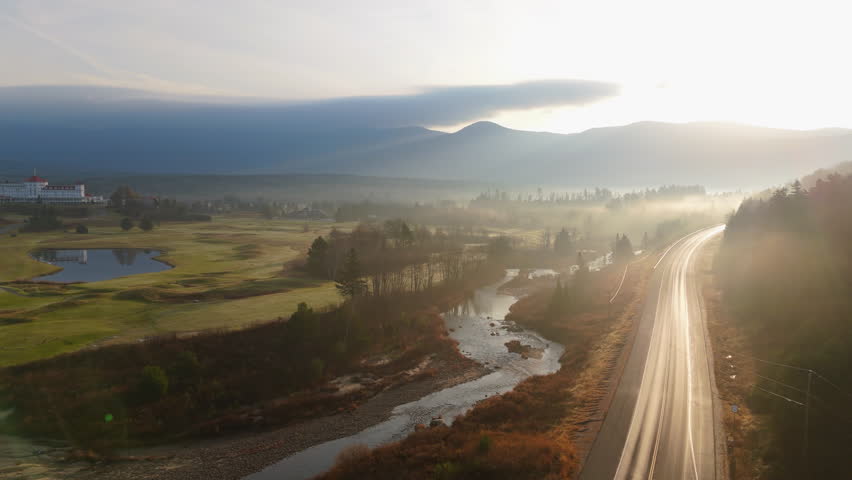 Breathtaking and aweinspiring beauty of Mount Washington, located in New Hampshire, showcasing vibrant hues of fall foliage against a stunning and picturesque backdrop of nature