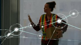 Carrying package, delivery worker with digital network animation in background. logistics, courier, transportation, technology, connectivity, distribution - Powered by Shutterstock - Get 15% off with code: PIKWIZARD15